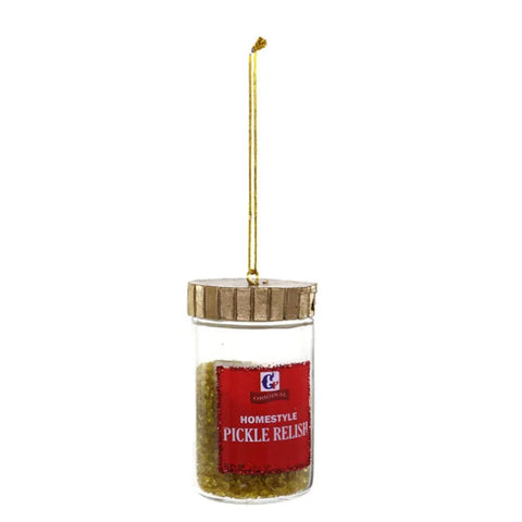 Glass ornament shaped like a jar of pickle relish with a red label, green textured filling, and a gold hanging loop.