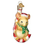 Tan Christmas Mouse sitting on a candy cane with a Santa hat
