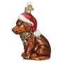 Side of Chocolate Labrador Puppy with Santa Hat and Scarf Ornament