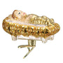Baby Jesus in a Manger in golds and white glass ornament . Side View