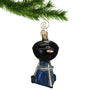 Black Grill Ornament like Weber Charcoal grill hanging by gold hook
