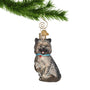 Blown Glass Grey Cairn Terrier Dog Ornament hanging on a gold swirl hook from a Christmas tree branch