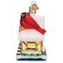 Cardinal sitting on a birdhouse glass Christmas ornament side view