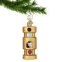Cat peeking out of a cat tower blown glass Christmas ornament hanging by a gold swirl hook from a Christmas tree branch