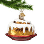 Cinnamon bun ornament hanging by a gold swirl hanger