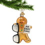 Glass Gingerbread Man looking like an optometrist Christmas Ornament