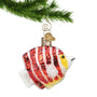 Blown Glass Peppermint Angel Fish hanging by a gold swirl hook from a Christmas tree branch