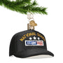 National Guard Ornament looking like baseball cap hanging from a gold swirl hook
