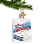 Hostess Donut Bag Glass Christmas Ornament hanging from a gold swirl hook on a tree branch