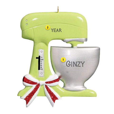 Personalized Christmas Ornament looking like a lime green kitchen stand mixer with red and white bow around mixer