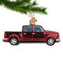 Red Pickup Truck Glass Christmas Ornament hanging from a tree branch