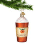 Pumpkin Spice Latte Glass Ornament hanging by a gold swirl hook from a Christmas tree branch