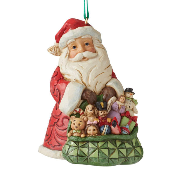 Santa with a Toy Bag filled with dolls, teddy bears, angels, snowmen, puppy and nutcracker Jim Shore Ornament 