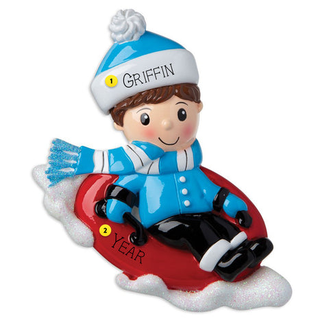 Snowtubing Ornament Boy for the Christmas tree