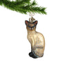 Siamese Cat Glass Ornament hanging by a gold swirl hanger