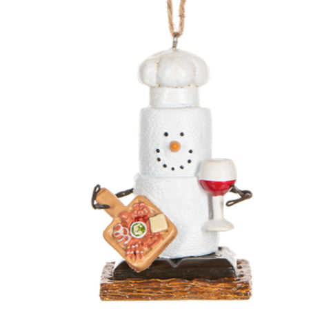 Original S'mores ornament holding a charcuterie board and glass of red wine with a chef's hat on 
