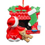Christmas Ornament for a child waiting for Santa with cookies and milk by a fireplace with stocking hanging and teddy bear next to a child in red pajamas